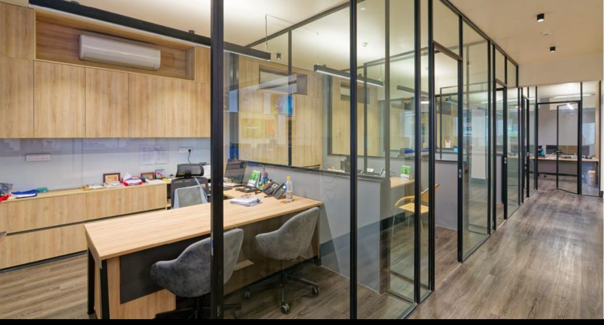 Private cabin suite with glass partitions